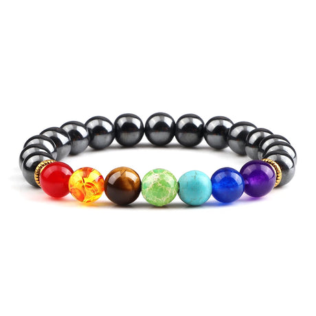 Colorful beaded bracelet with black beads and rainbow-colored beads on a white background
