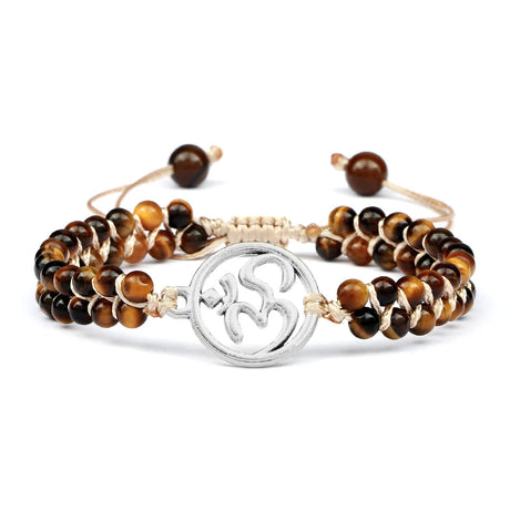 Set of tiger eye beaded bracelets with a silver OM symbol charm on a white background