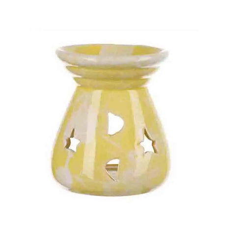 Yellow ceramic oil burner on a white background