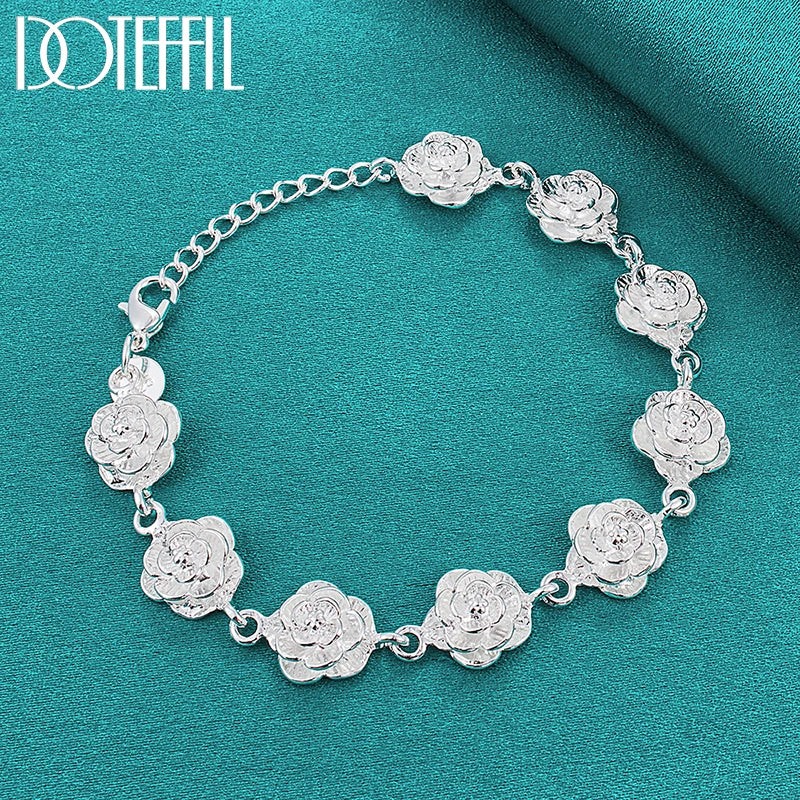 Silver floral bracelet on a teal background with 'Doteffil' branding.
