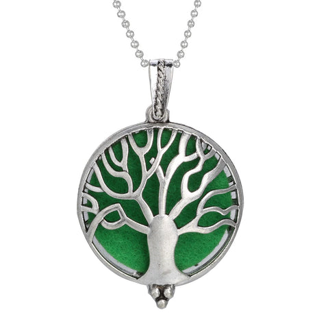 Silver pendant with green tree design on a white background
