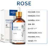 Rose essential oil bottle with dropper and packaging on a white background