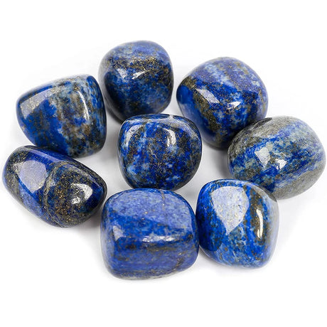 Blue and gray tumbled stones on a white background