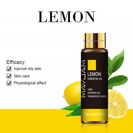 Bottle of lemon essential oil with lemons and leaves on a white background