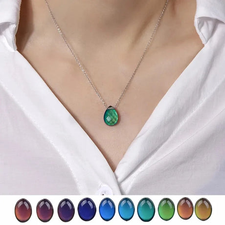 Necklace with a green pendant on a white shirt, with color swatches below.