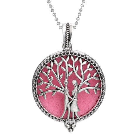 Necklace with a pink tree-shaped pendant featuring two people holding hands on a white background.
