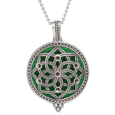 Green and silver pendant necklace on a white background