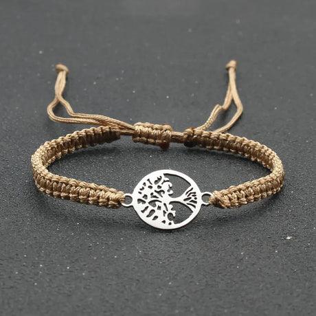 Bracelet with tree of life charm on a dark background