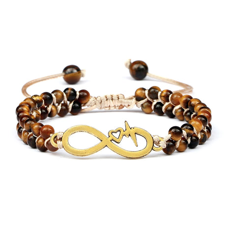 Bracelet with brown beaded design and gold infinity symbol on a white background