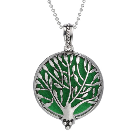 Tree-shaped pendant with green center and silver branches on a white background