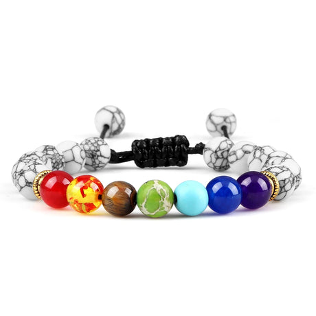 Colorful beaded bracelet with black marbleized ends on a white background