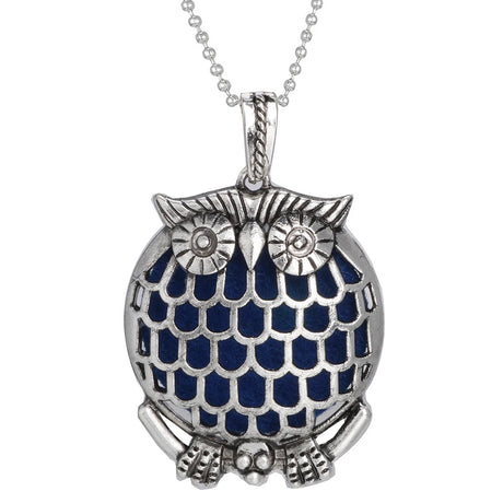 Silver owl pendant with blue accents on a white background