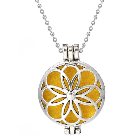 Silver and yellow floral pendant necklace on a white background
