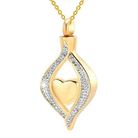 Gold pendant with heart design and diamond accents on a white background