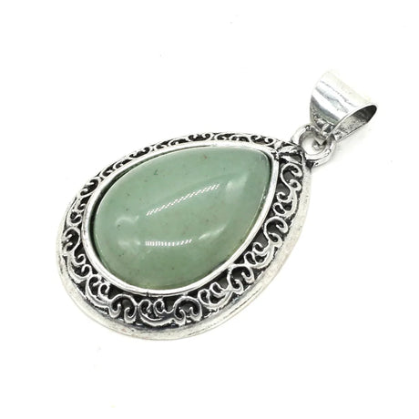 Silver pendant with a green stone on a white background