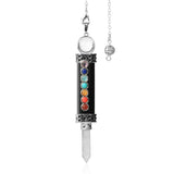 Necklace with a sword-shaped pendant featuring colorful stones on a white background