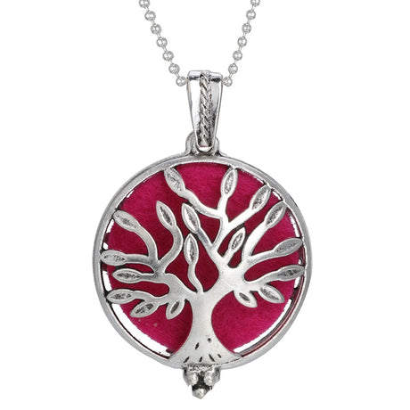 Silver tree of life pendant with red center on a white background