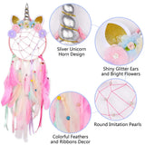 Unicorn-themed dreamcatcher with decorative elements on a white background