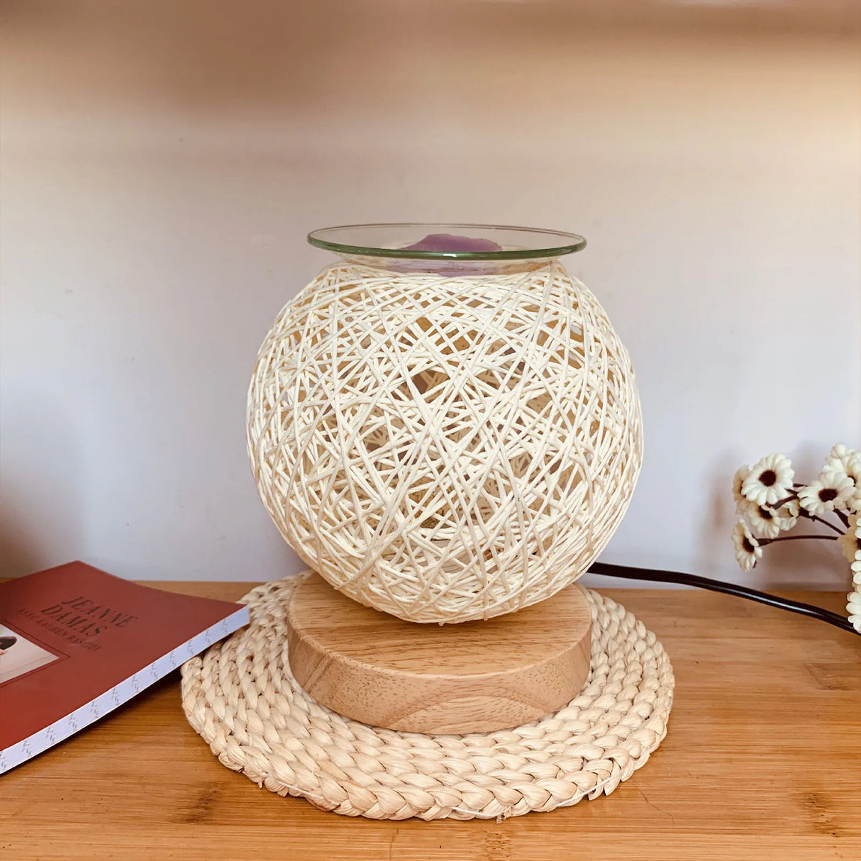 Decorative lamp with woven design on a wooden surface