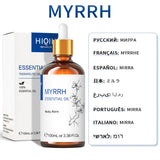 Myrrh essential oil bottle with dropper and packaging on a white background
