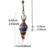 Colorful crystal pendant with measurements on a white background