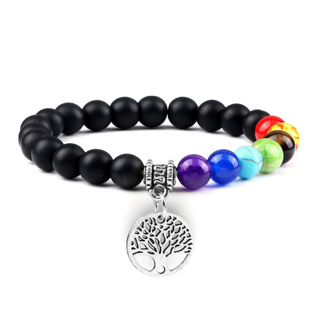 Black beaded bracelet with colorful beads and a silver tree of life charm on a white background