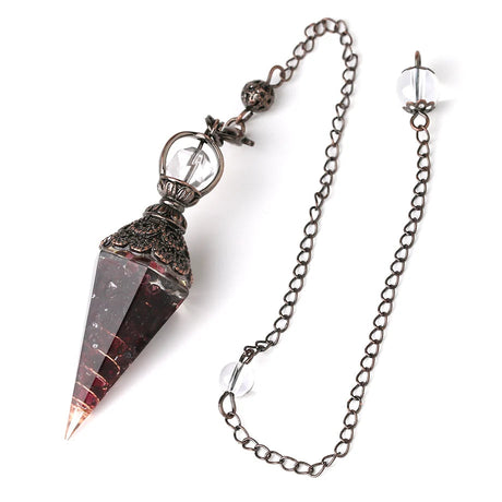 Crystal pendulum with chain on a white background