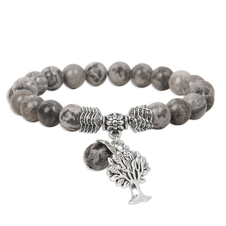 Gray beaded bracelet with silver charms on a white background
