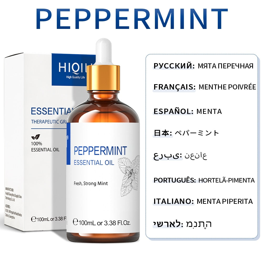 Peppermint essential oil bottle with dropper and packaging on a white background
