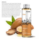 FEXMS Argan oil bottle with argan seeds and leaves on a white background