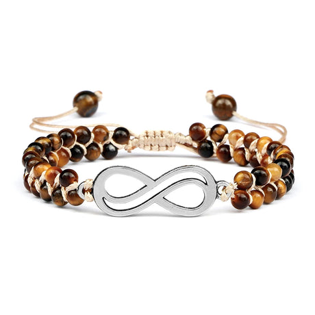 Bracelet with tiger eye beads and silver infinity symbol on a white background