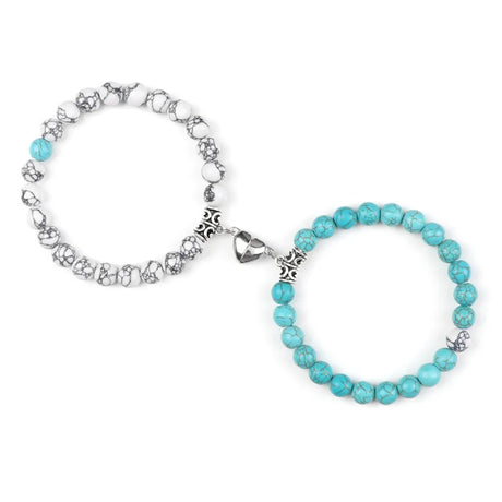 Two turquoise bracelets, one chain and one beaded, on a white background