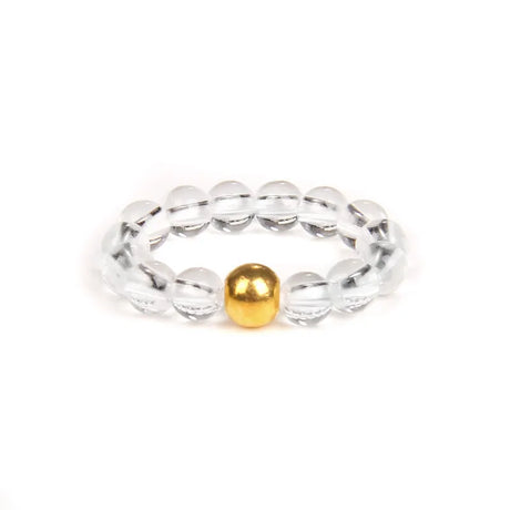 Silver beaded ring with a gold bead on a white background