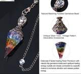 Colorful resin pendulum with chain on a dark background, featuring text about its features.