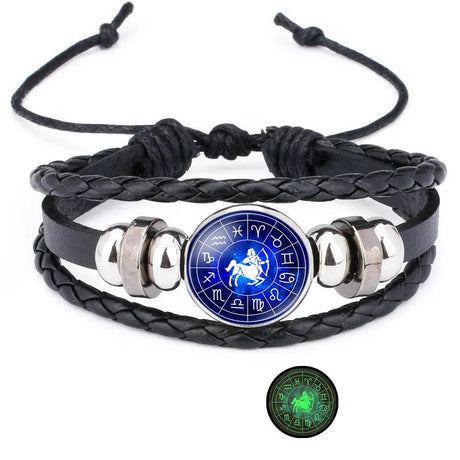 Black braided leather bracelet with a blue astrological symbol charm on a white background