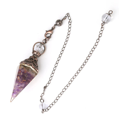 Crystal pendulum with chain on a white background