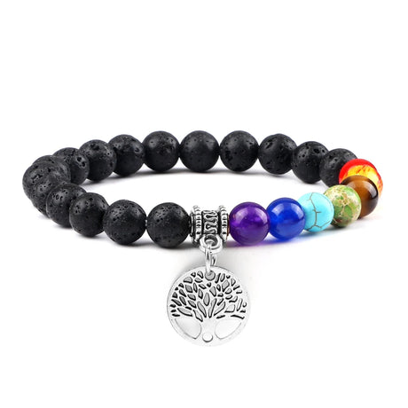 Chakra beaded bracelet with tree of life charm on a white background
