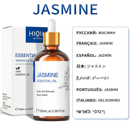 Jasmine essential oil bottle with dropper and packaging on a white background