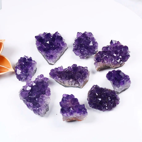 Purple crystal geodes on a white background
