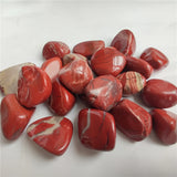 Red marbled stones on a white background