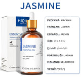 Jasmine essential oil bottle with dropper and packaging on a white background