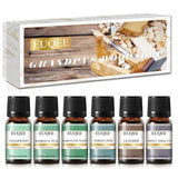 Set of EUQEE fragrance oils with packaging labeled 'Grandpa's Woodside' on a white background.
