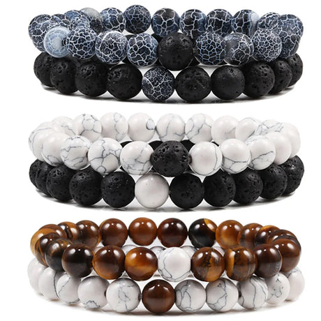 Set of three beaded bracelets with different color schemes on a white background
