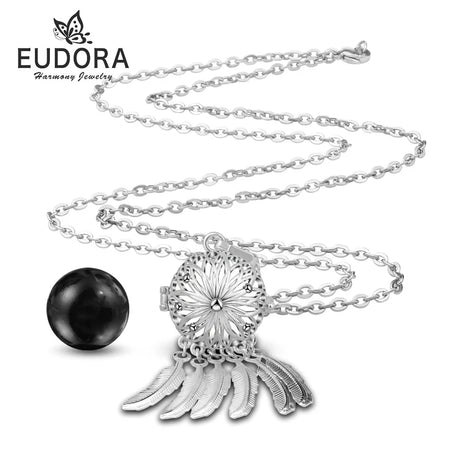 Silver necklace with black pendant on a white background, featuring the Eudora brand.