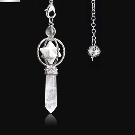 Crystal pendant necklace with silver chain on a black background
