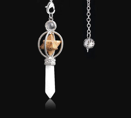 Silver pendant with crystal and stone on a black background