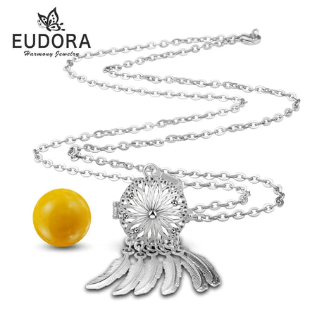 Silver necklace with a yellow pendant on a white background, featuring the Eudora brand.