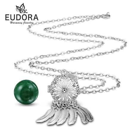 Silver necklace with green pendant on a white background, featuring the Eudora brand.