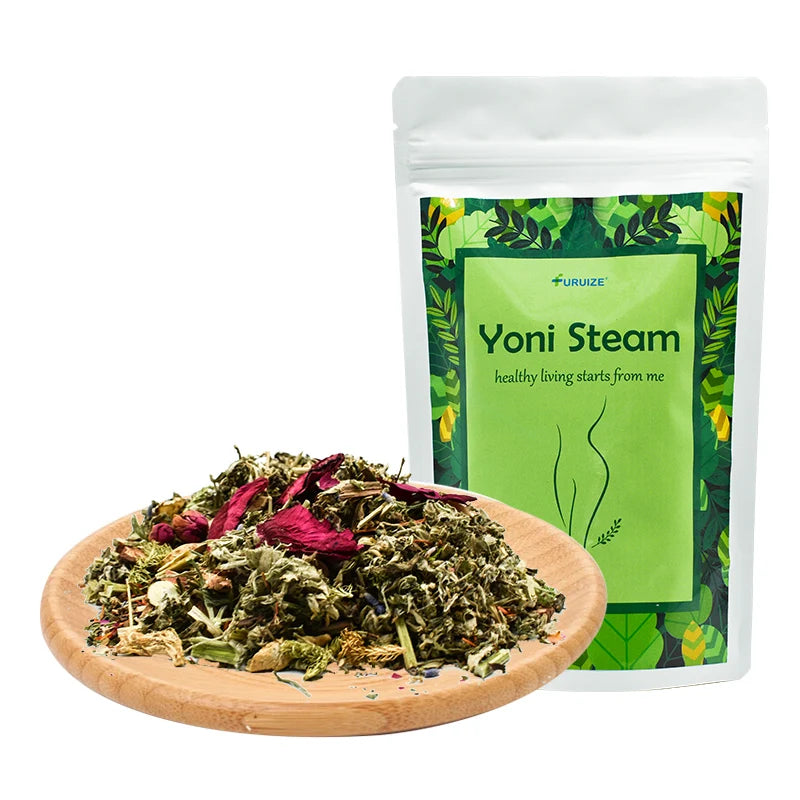 Yoni Steam herbal mix on a wooden plate with packaging in the background