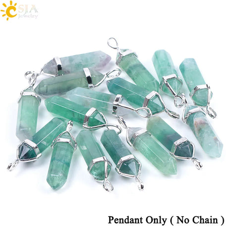 Green crystal pendants with silver loops on a white background